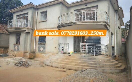 Bank sale house in kawempe.